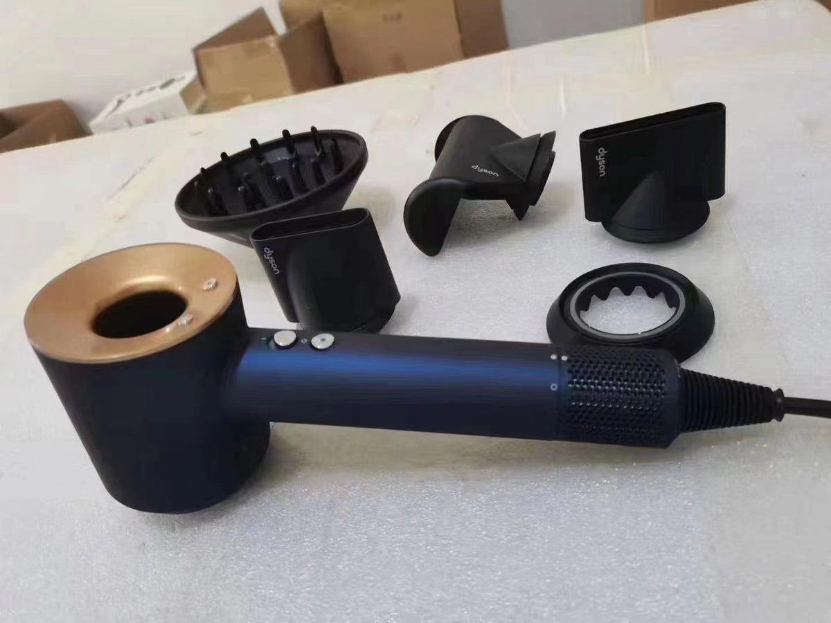 Golden Dyson Supersonic HD08 hair dryer with attachments