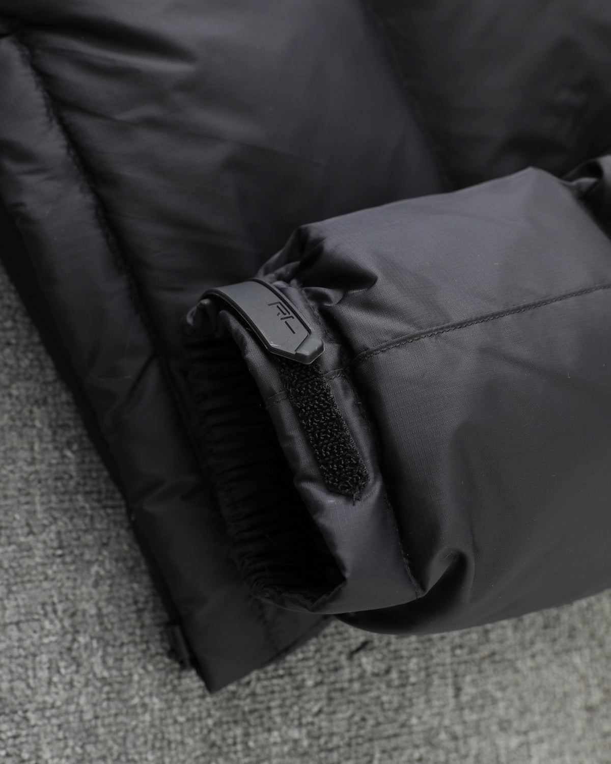 Polo puffer jacket sleeve cuff detail