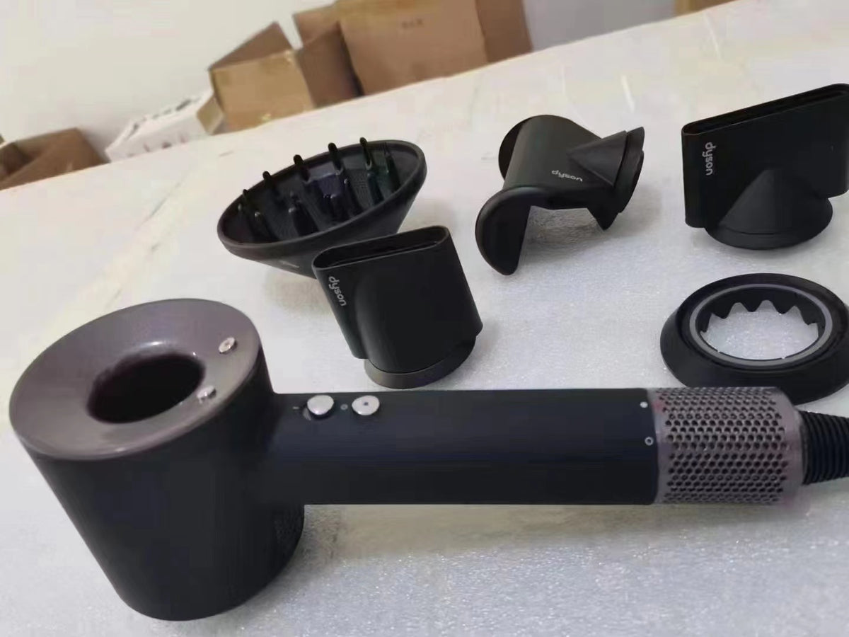 Black Dyson Supersonic HD08 hair dryer with attachments