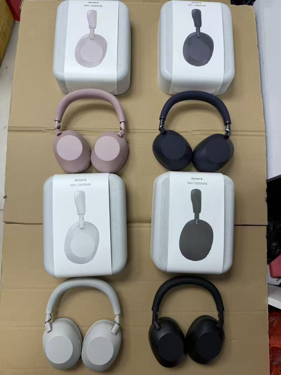 Pink Sony WH-1000XM6 headphones and packaging