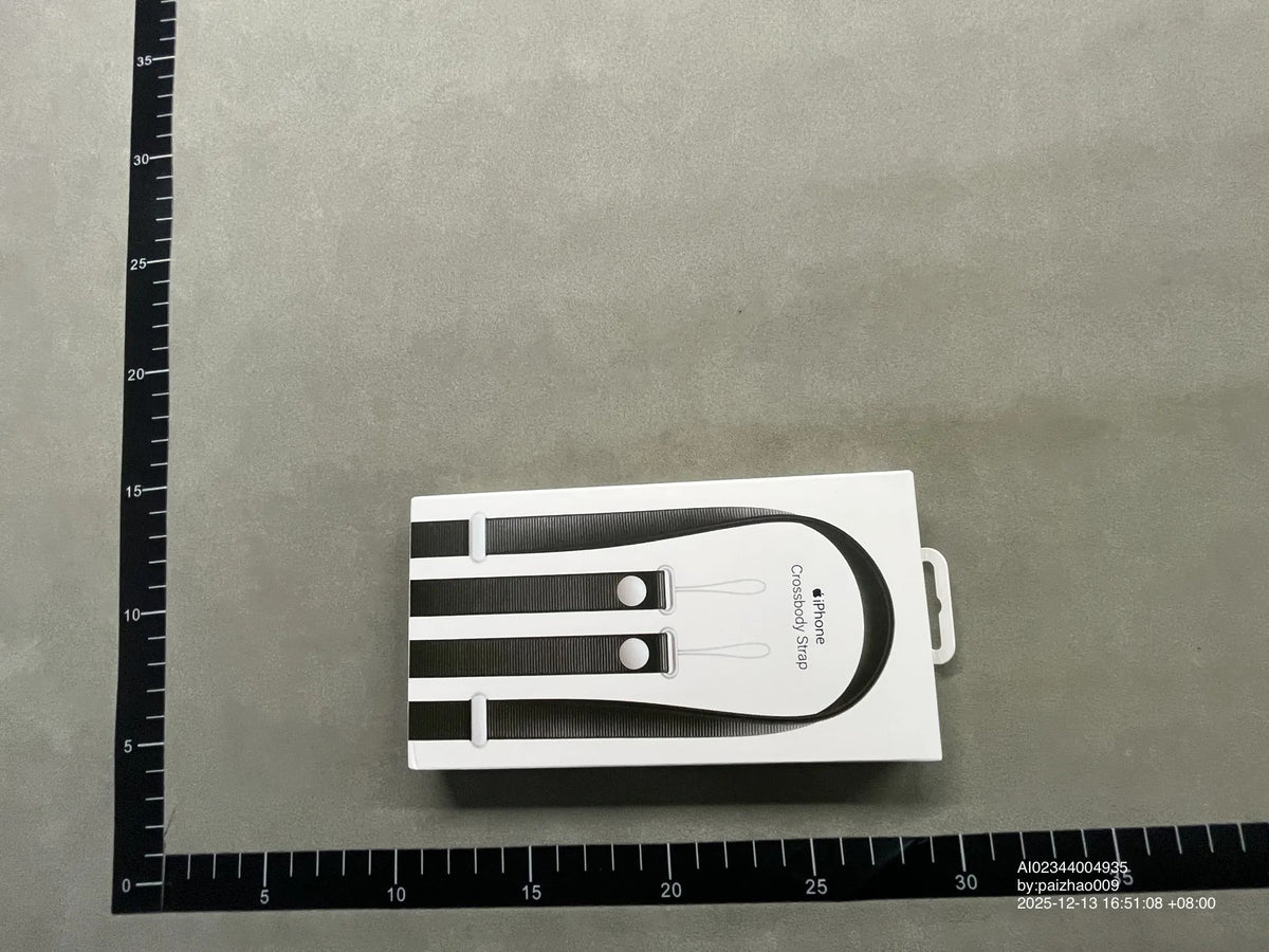 Blue crossbody phone strap in packaging