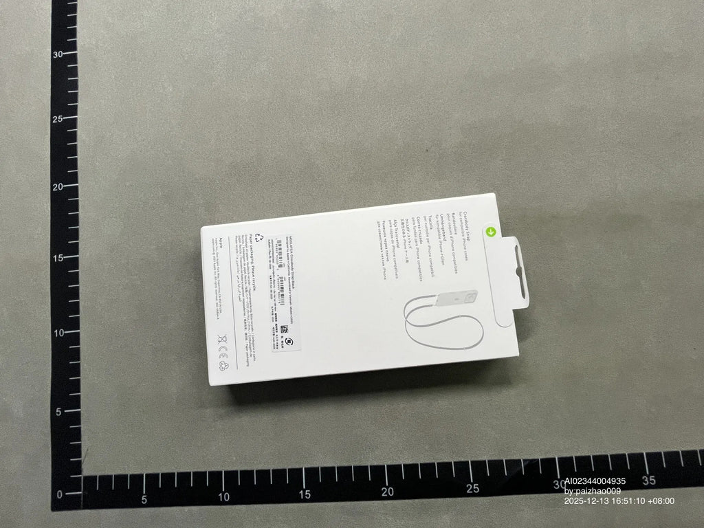 Orange crossbody phone strap in packaging