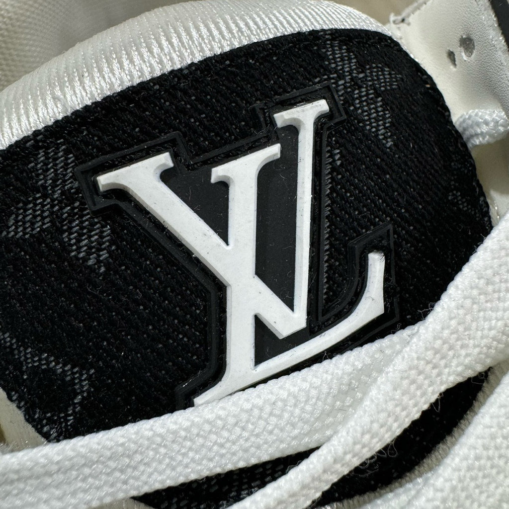 Black and white Louis Vuitton trainer sneaker side view