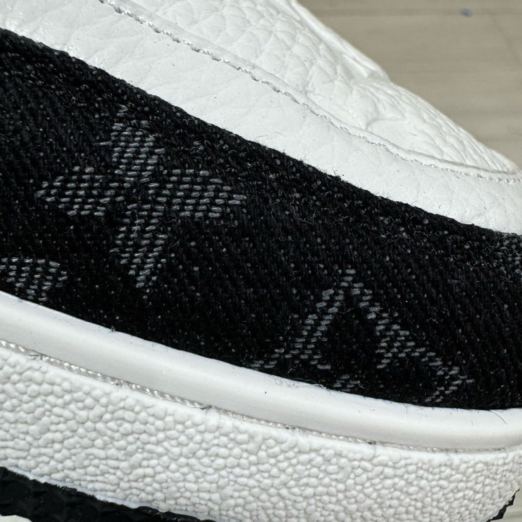 White and red Louis Vuitton trainer sneaker side view