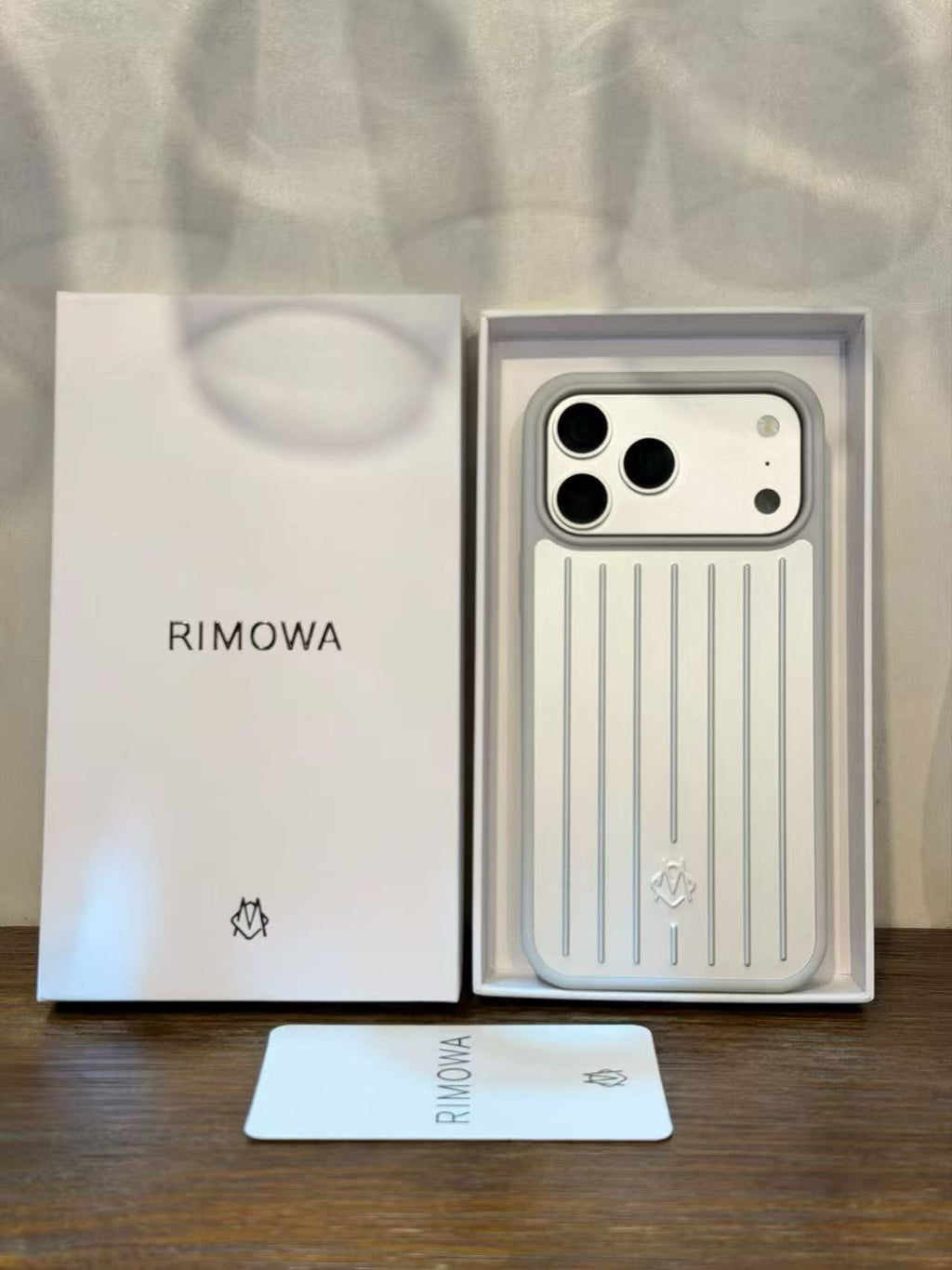 Interior view of black luggage-style iPhone 17 Pro Max case