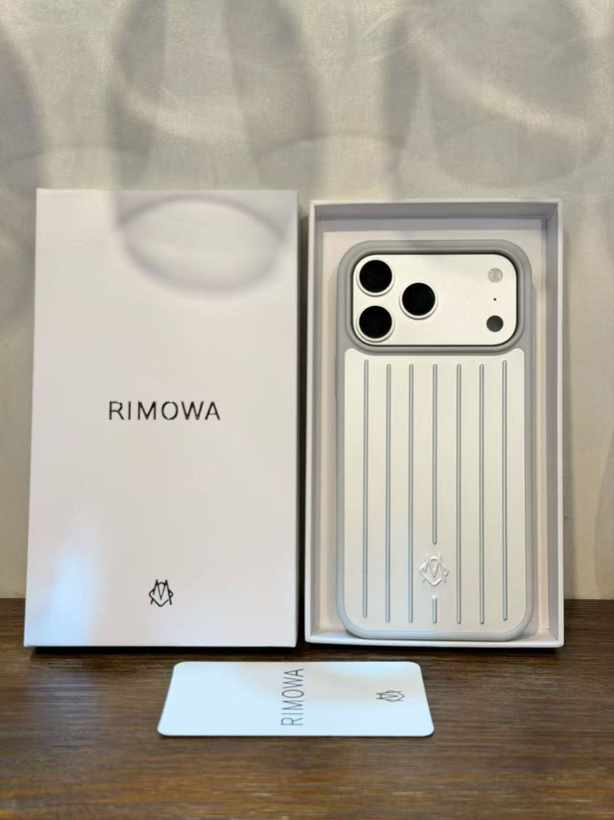 Interior view of black luggage-style iPhone 17 Pro Max case