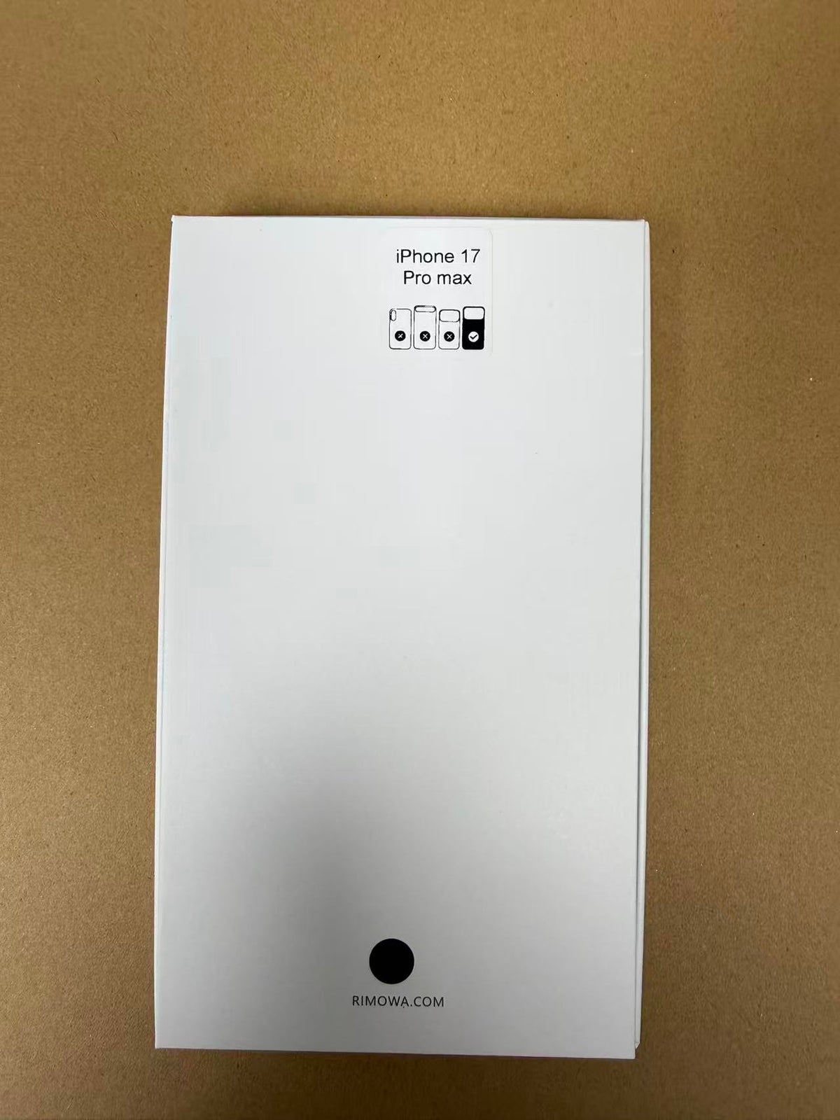 White packaging for the luggage-style phone case