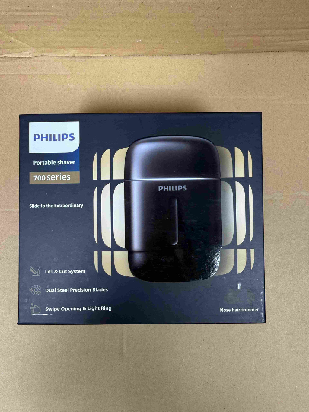 Philips portable shaver with box, travel case, cable, brush, and accessories