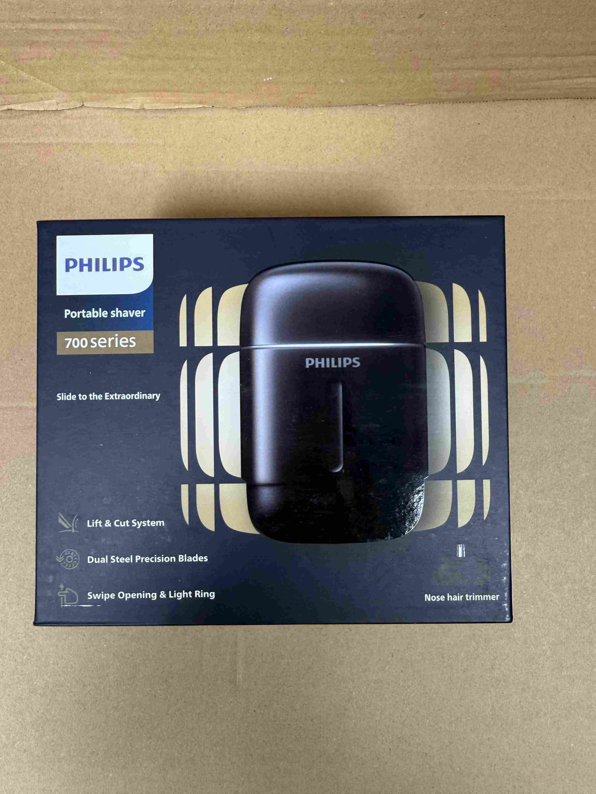 Philips portable shaver with box, travel case, cable, brush, and accessories