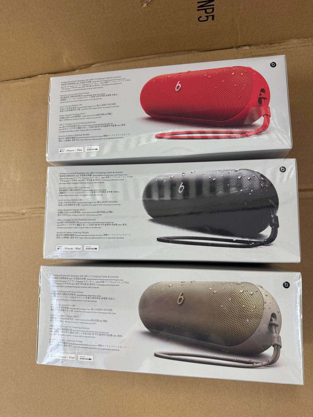 Black Beats Pill speaker with box, instructions, and USB-C cable