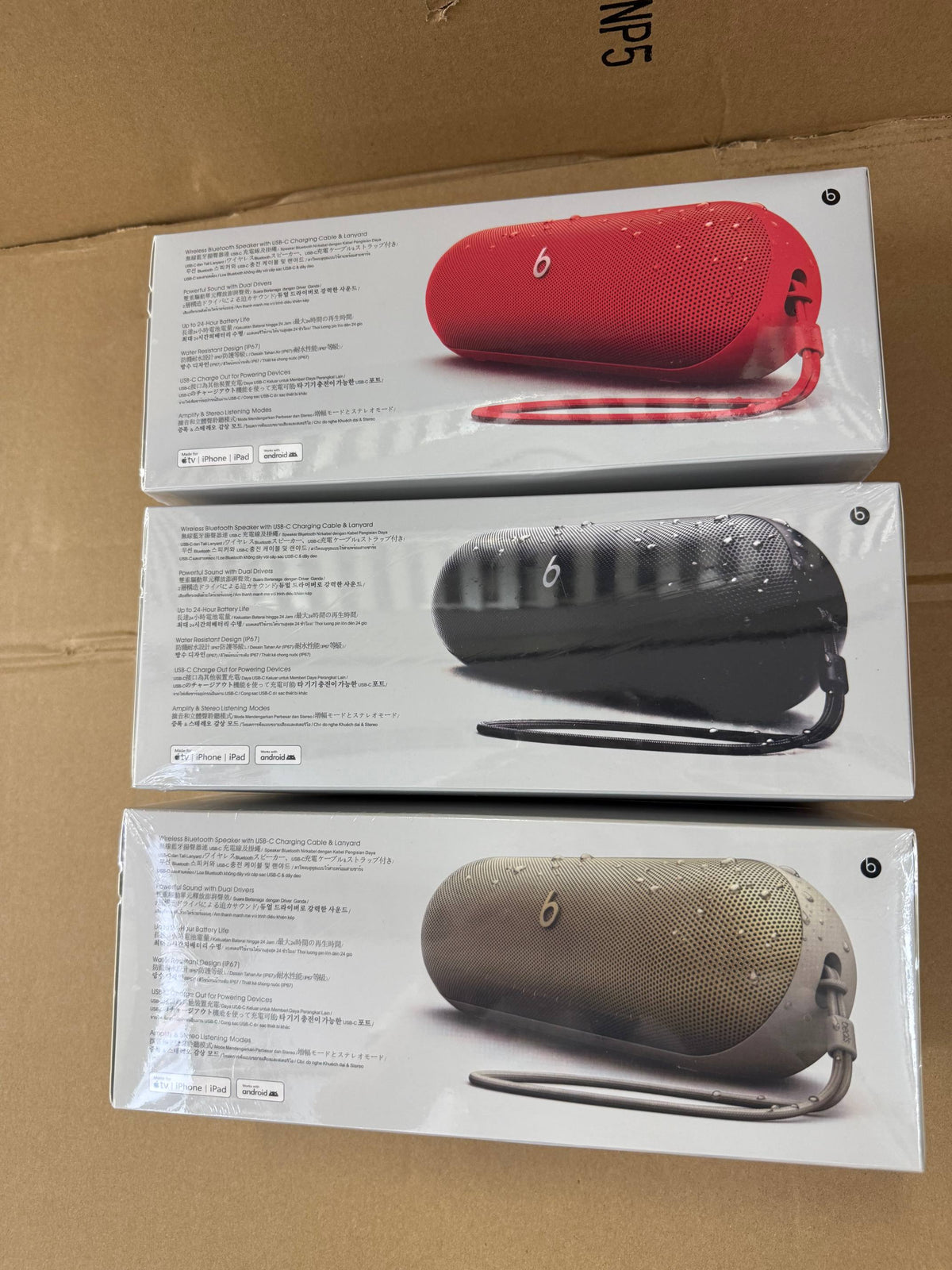 Black Beats Pill speaker with box, instructions, and USB-C cable