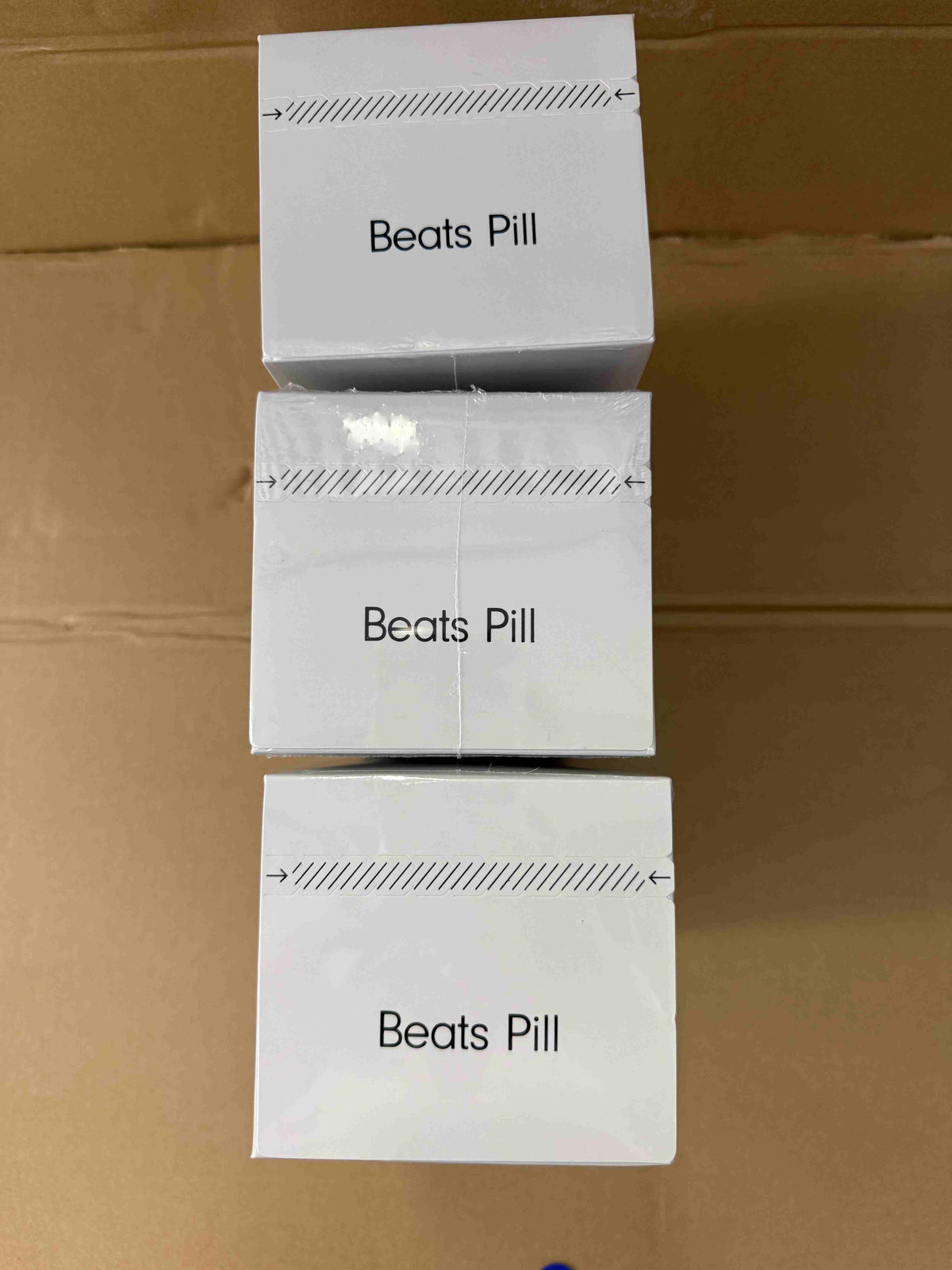 Black Beats Pill speaker with packaging and USB-C cable