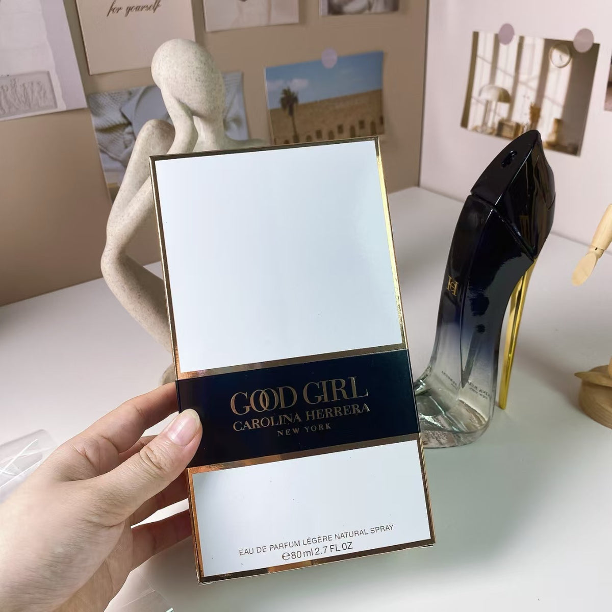 Clear and black high heel perfume bottle with packaging