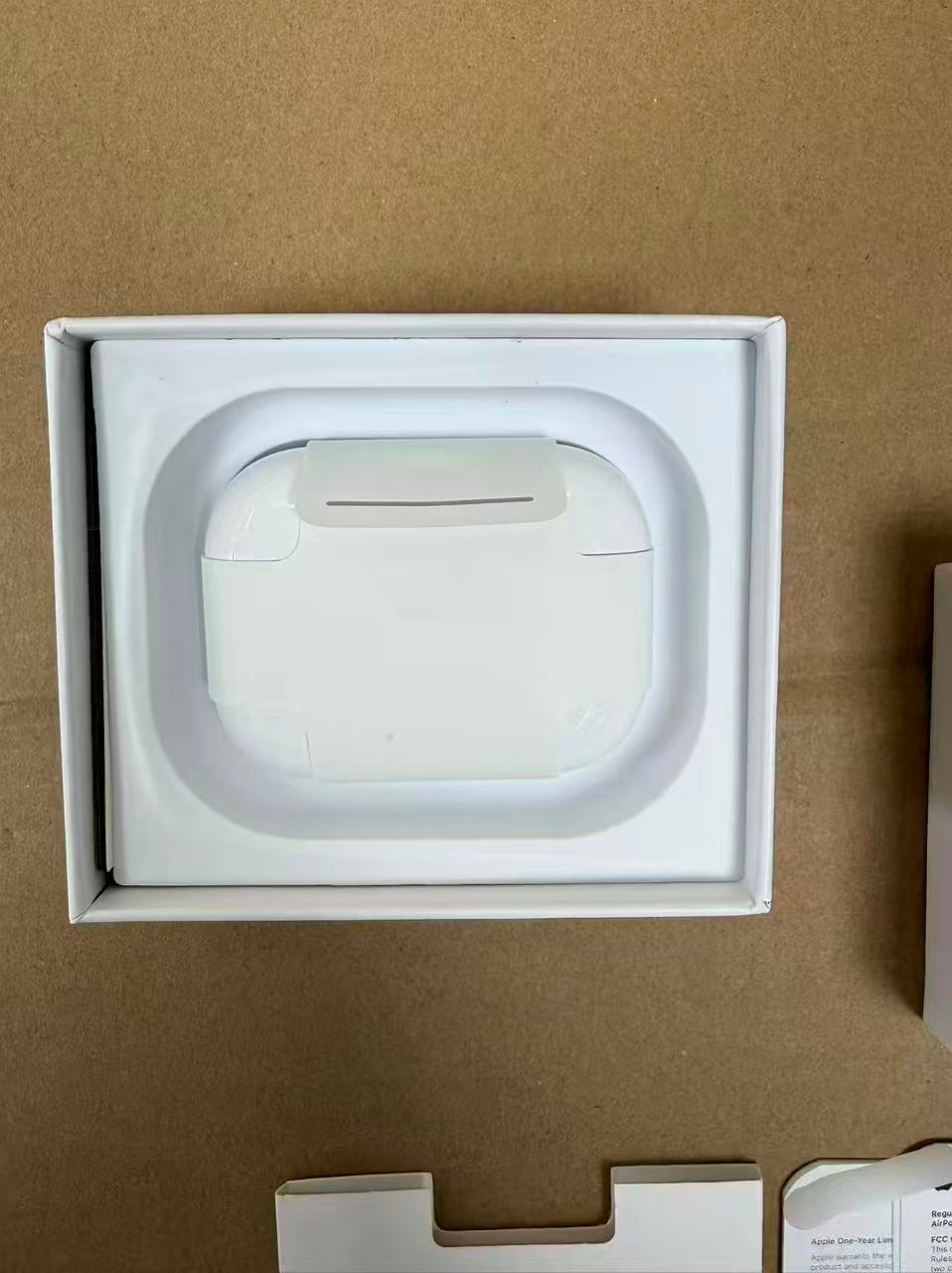 AirPods Pro 3 charging case, ear tips, and included materials
