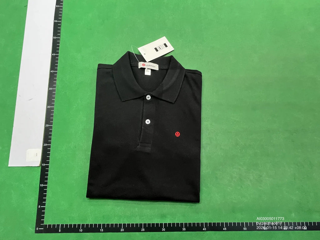 White Lululemon polo shirt laid flat
