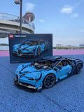 Assembled blue LEGO Technic supercar with box