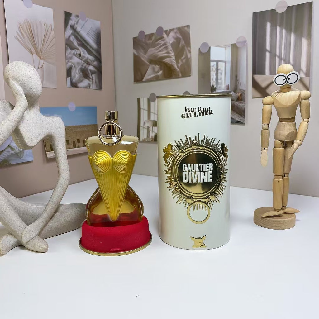 Jean Paul Gaultier Divine fragrance bottle and packaging collage