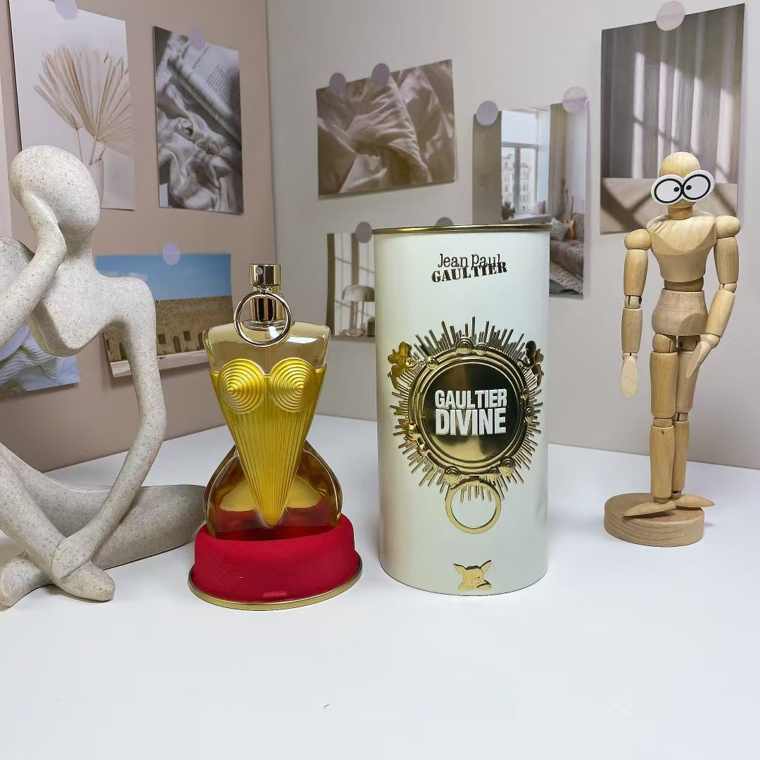 Jean Paul Gaultier Divine fragrance bottle and packaging collage