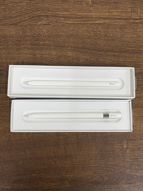 Apple Pencil retail boxes showing the white stylus