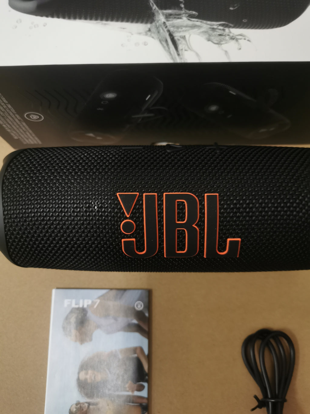 Close-up of black JBL Flip 7 speaker