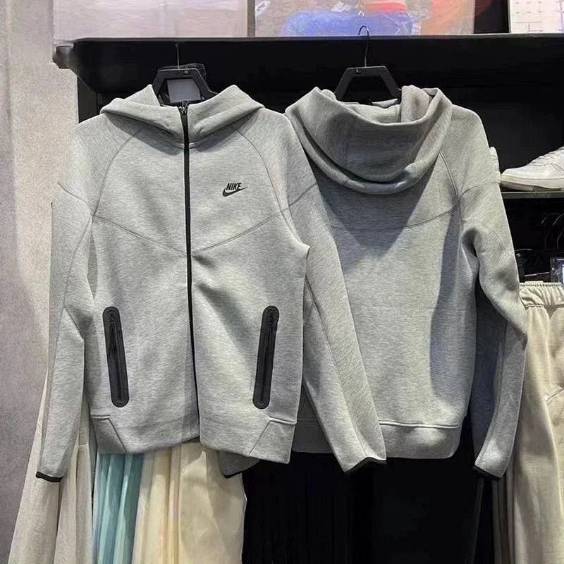 Close-up of gray fabric and black zip detail
