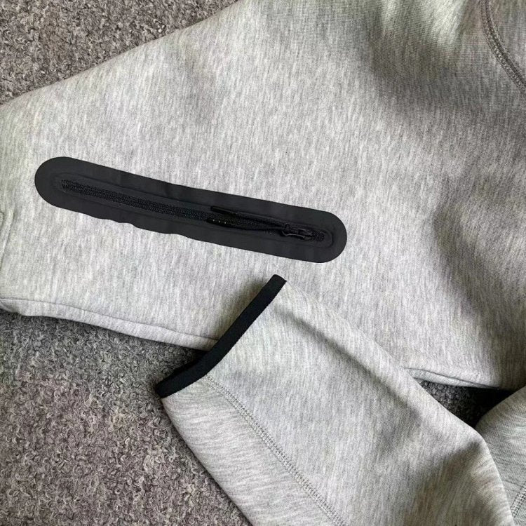 Front and back of gray hooded zip jacket