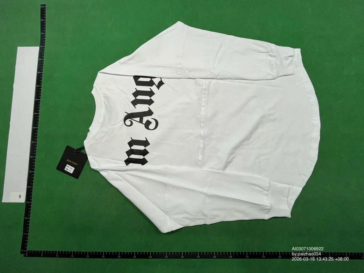 White long-sleeve shirt showing back lettering