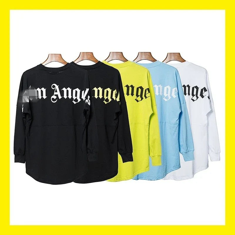 White long-sleeve logo shirt laid flat