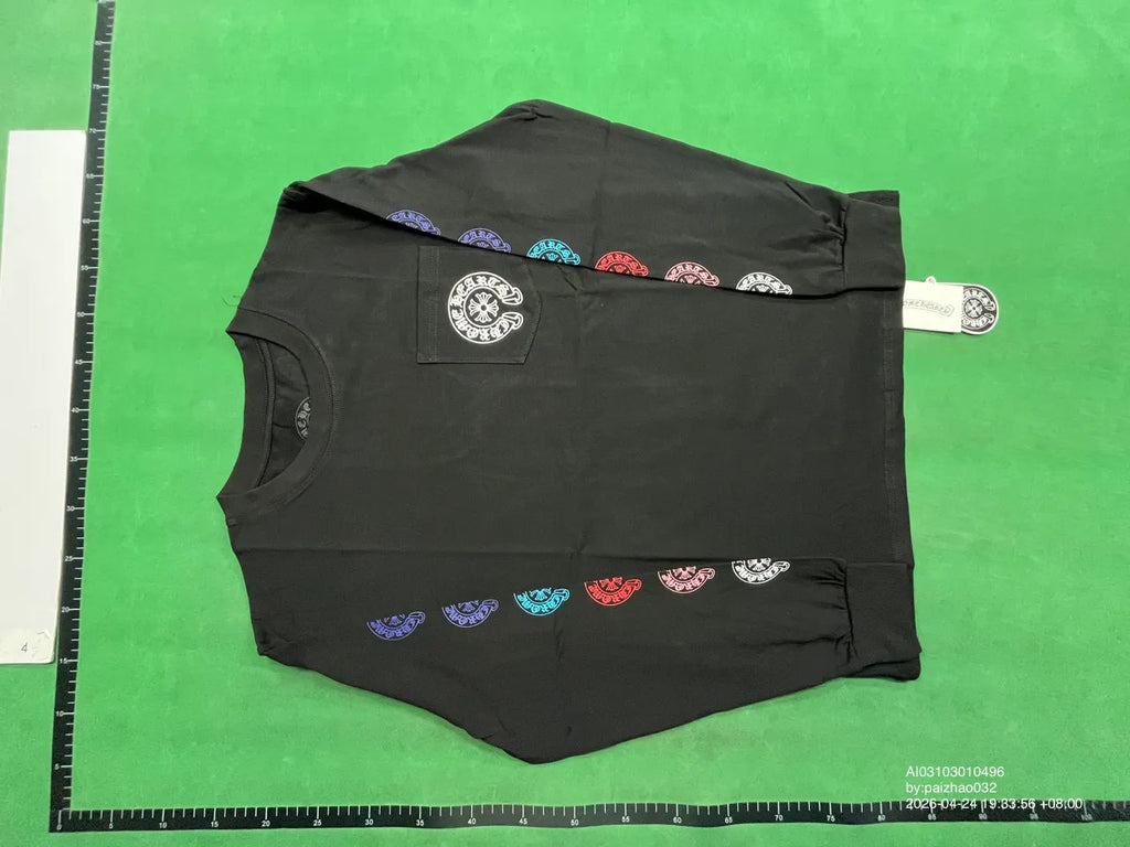 Front of black long-sleeve shirt with chest pocket and multicolor sleeve graphics
