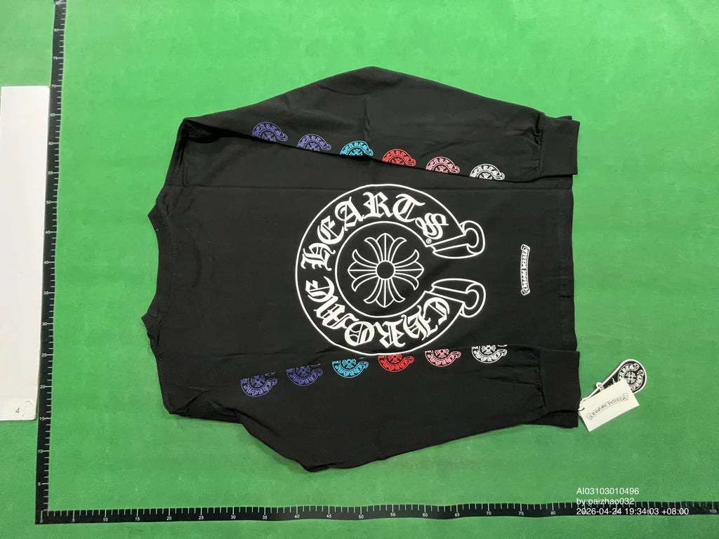 Black long-sleeve shirt with large back graphic and multicolor sleeve prints